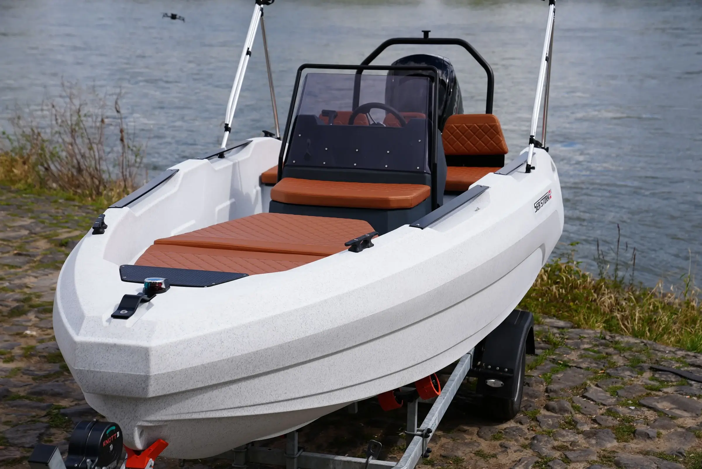 Bow of the SeaStorm 17 with brown sun lounger