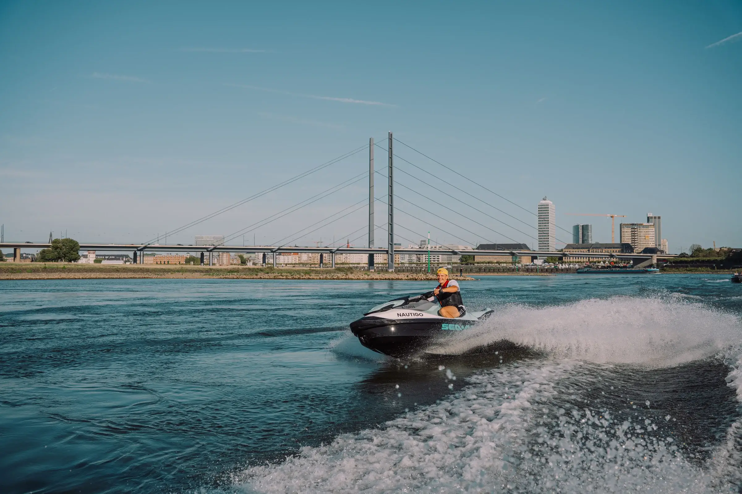 Sea-Doo GTI 130 under way in front of the Rheinkniebrücke