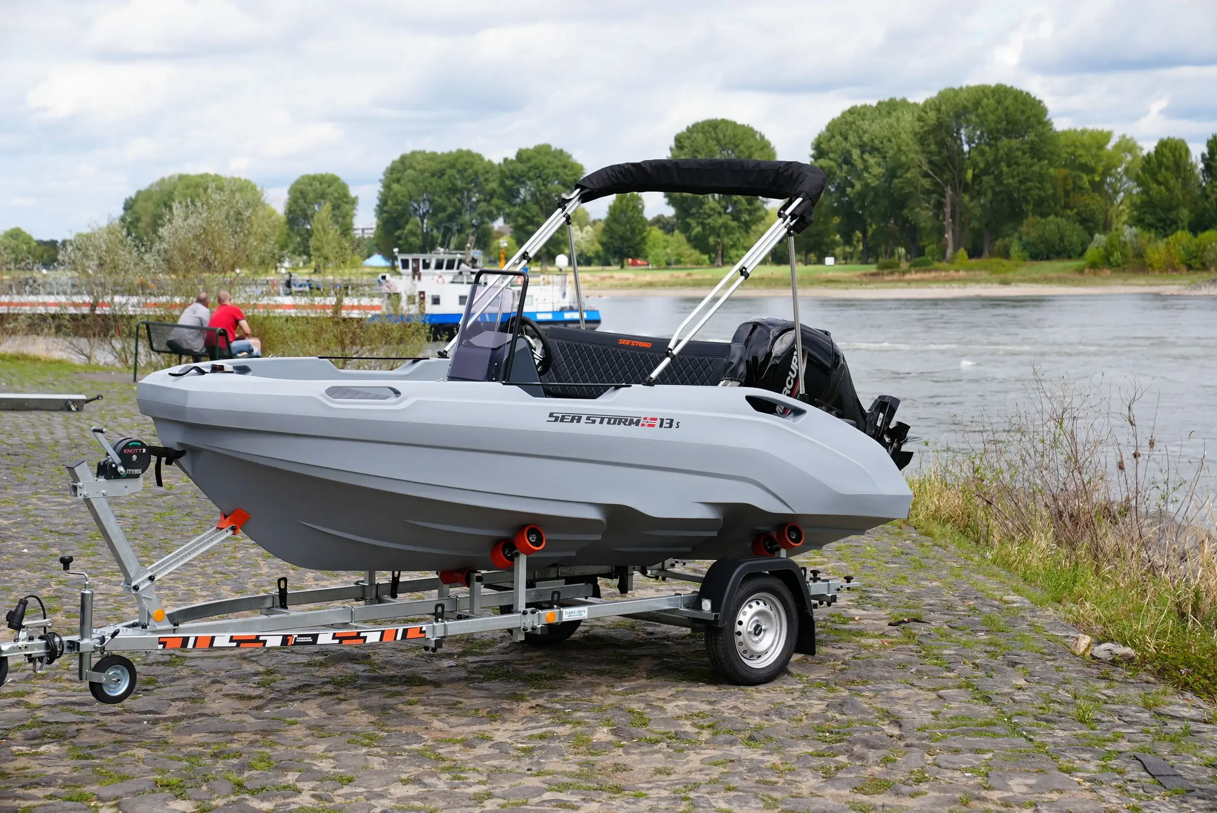 SeaStorm 13s in side view with Mercury F60