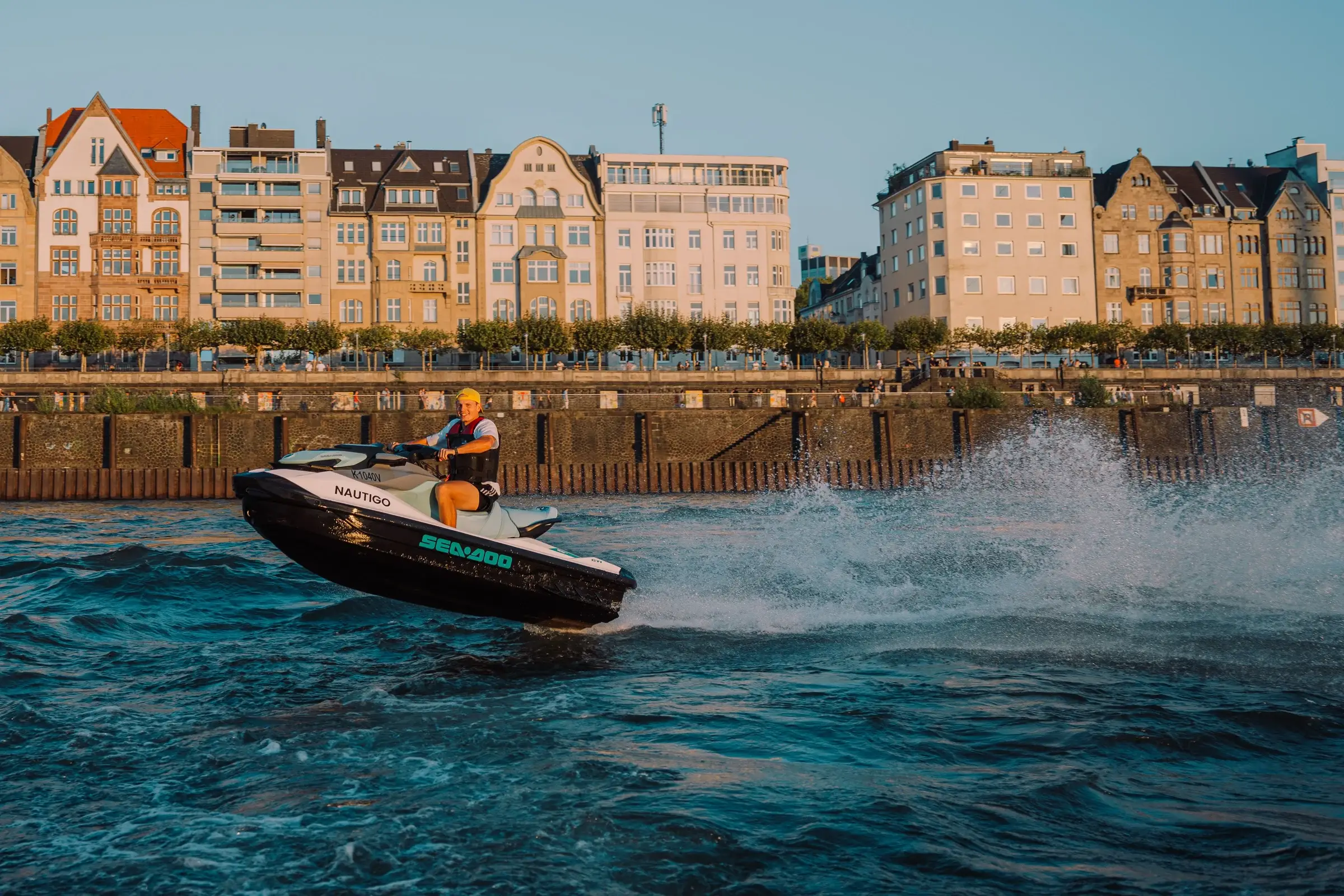 Sea-Doo GTI 130 under way on the Rhine bank