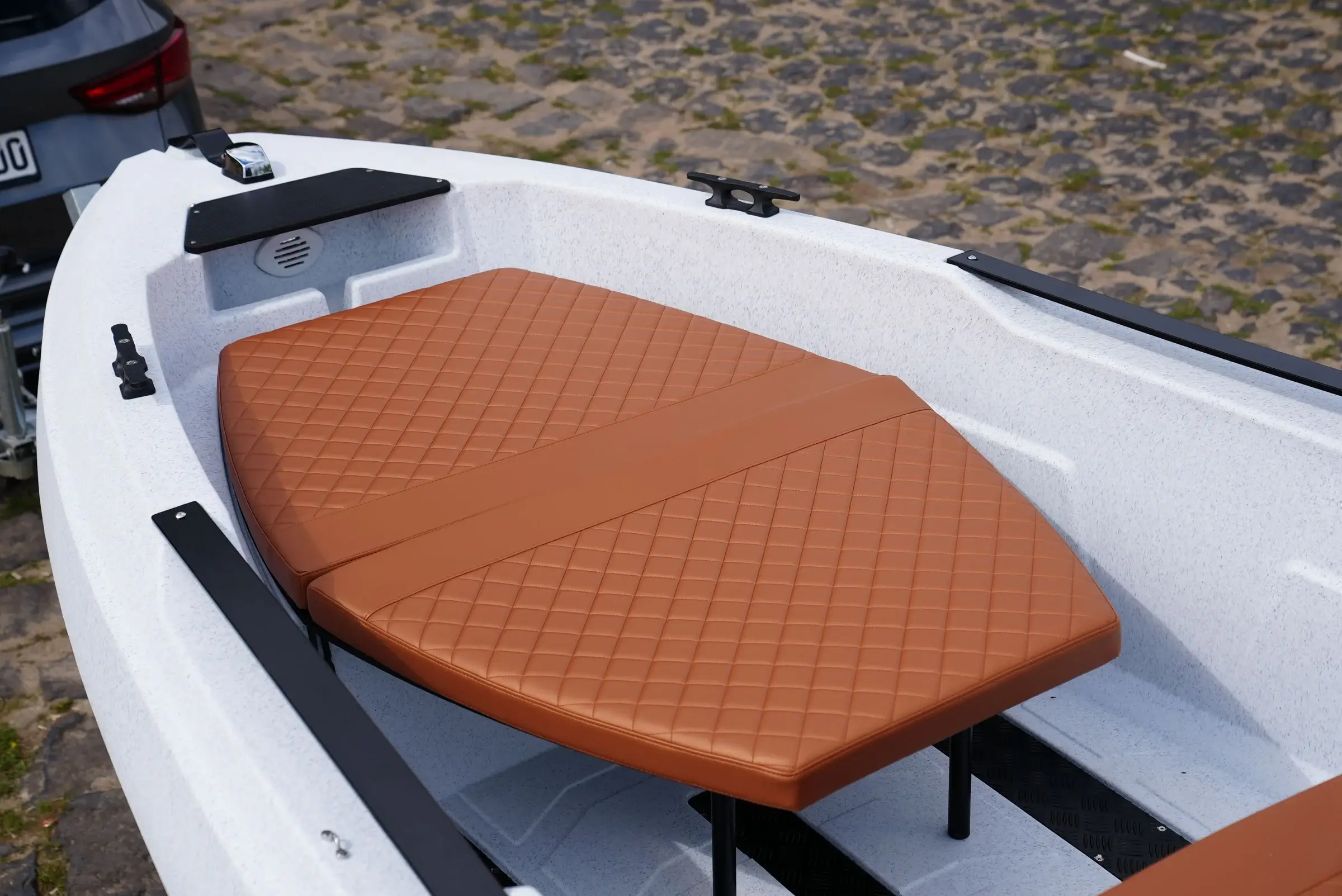 Sun lounger in the bow of the SeaStorm 17