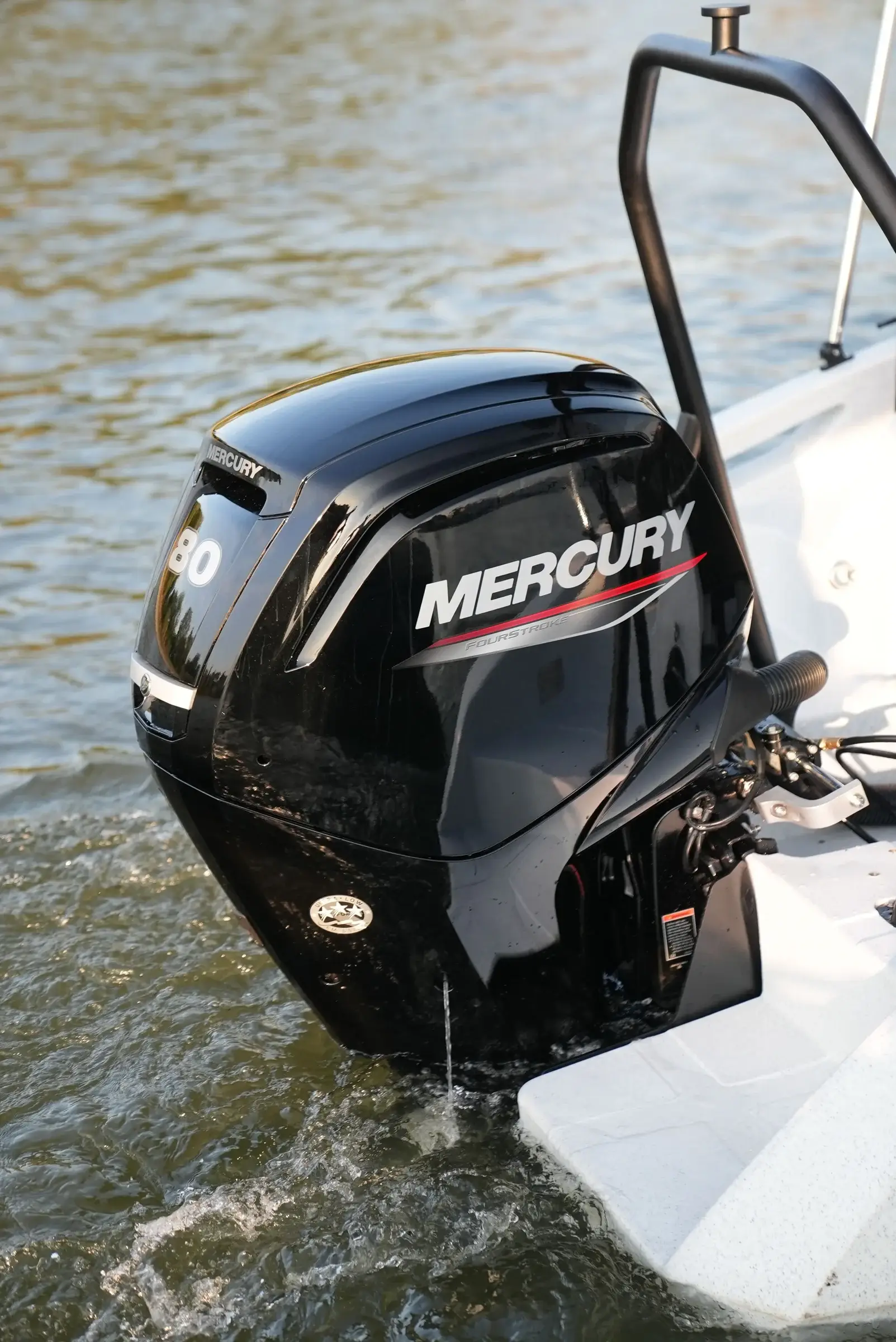 Mercury F80 under way, from the side