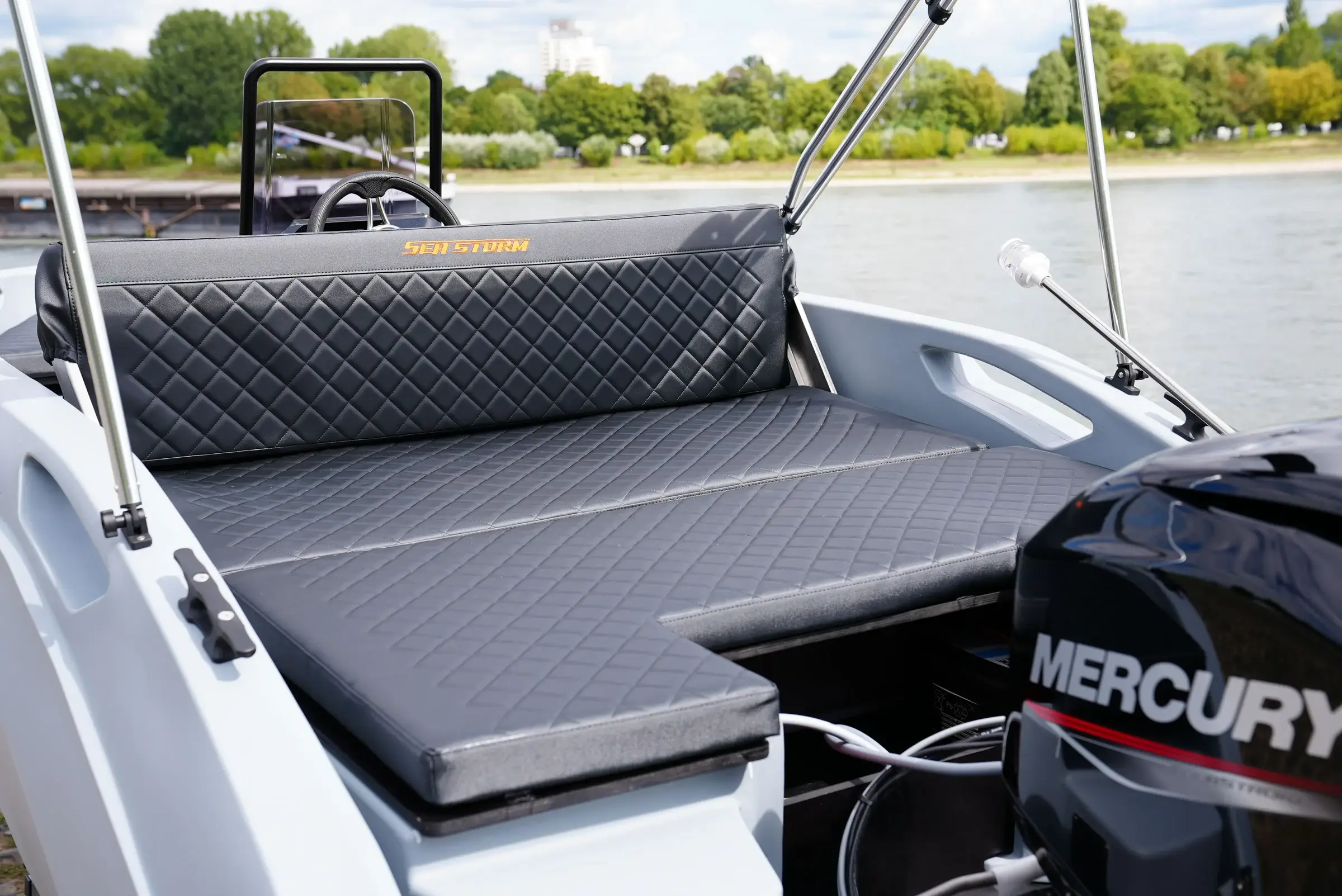 Rear sun pad of the SeaStorm 13s with Mercury F60