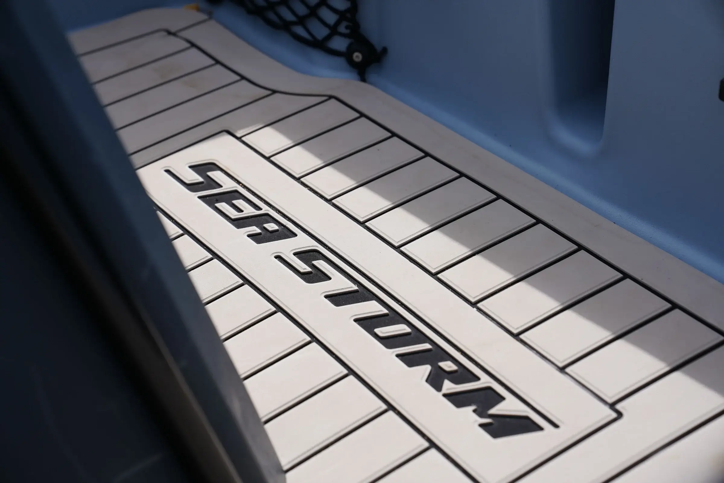Deck covering with SeaStorm lettering
