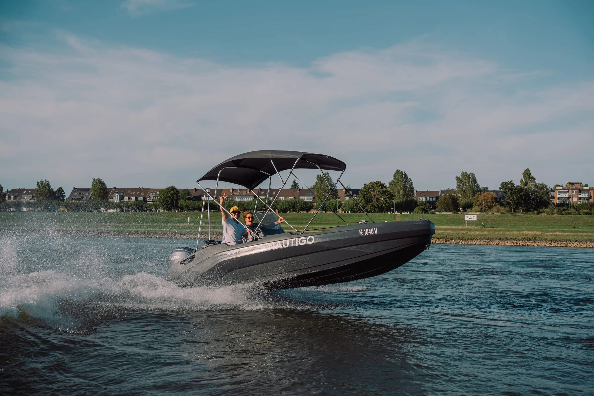 HDPE motorboat SeaStorm 17 in three-quarter view from the front, above water